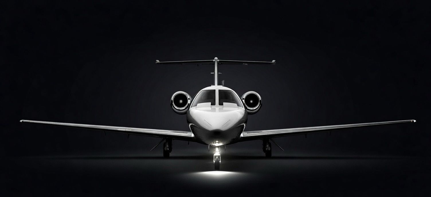 Cessna Citation CJ1+ executive jet seen from the front on the runway